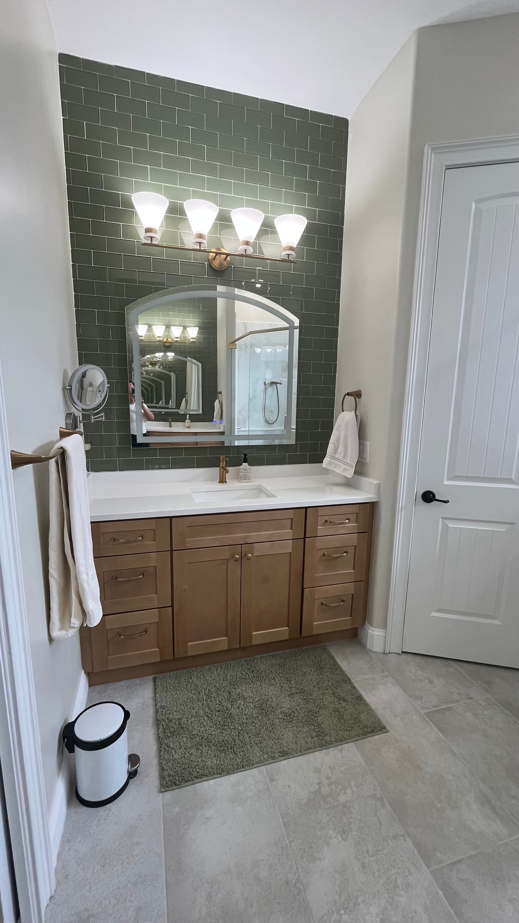 Luxury freestanding soaking tub in renovated bathroom